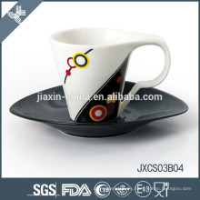Taza y platillo de café ovalada de la porcelana 180CC, nuevo sistema de la taza del diseño, sistema pequeño de la taza